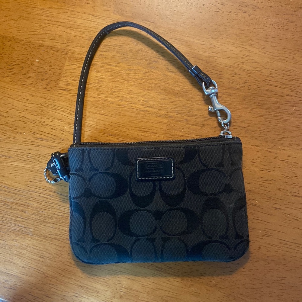 Used black Coach wristlet